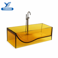 Baignoire en résine transparente ambrée au design architectural moderne, portable, unique, ergonomique, design en S, de luxe, profonde, pour hôtel et appartement