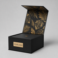 Boîte à rabat rigide noir mat avec fermeture magnétique, intérieur botanique tropical doré, logo personnalisé, emballage cadeau de luxe