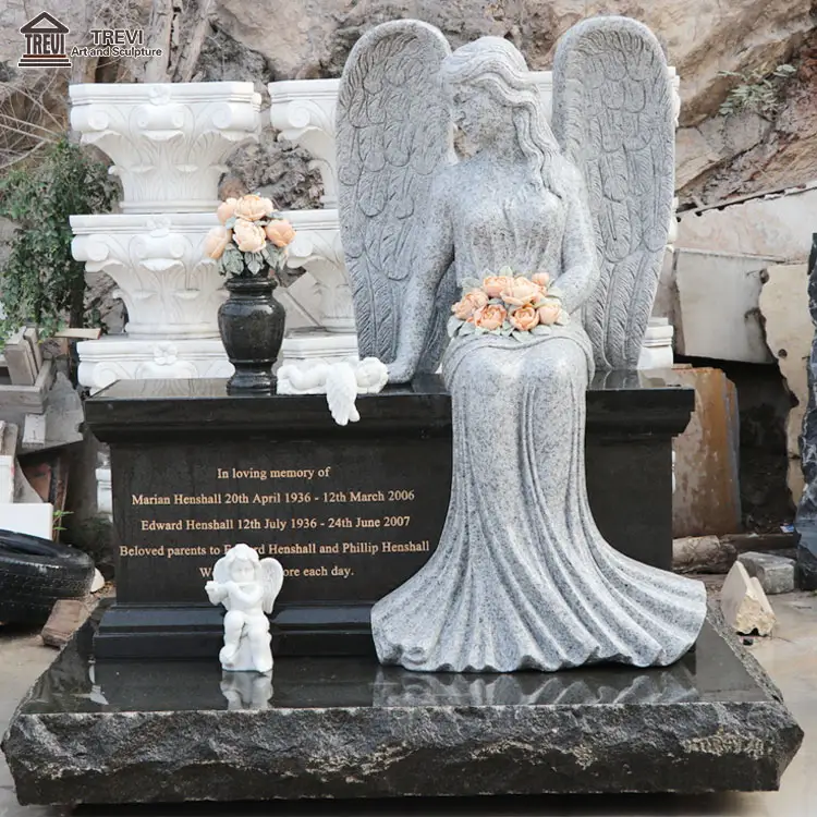 Modern el oyma heykel oturan melek <span class=keywords><strong>çiçek</strong></span>ler ile el mezar taşları ve mezar taşları