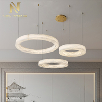 Luminaire de décoration d'intérieur personnalisé Maison Villa Salle à manger Salon Lustre moderne en albâtre avec anneau à LED