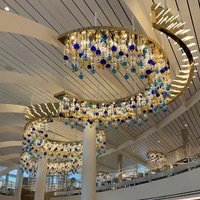 Lustre en cristal de forme personnalisée Hauteur réglable Design moderne Lobby d'hôtel Département des ventes Sable Table Art Lampe Ingénierie