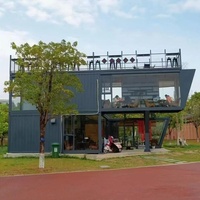 Edificio de Tiendas en Contenedores de Varios Pisos Personalizado, Cafetería Modular Prefabricada en Contenedores con Terraza en el Techo