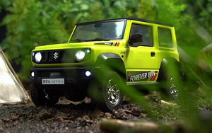 Coche de Control Remoto <span class=keywords><strong>Suzuki</strong></span> <span class=keywords><strong>Jimny</strong></span> 2.4G Proporcional RTR Eléctrico con Sonido, Luces LED y Humo, Escala 1/16, SUV <span class=keywords><strong>RC</strong></span> con Remolque, Juguete de Regalo - Product Image 2