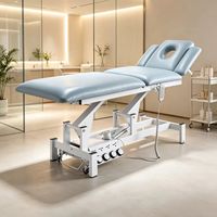 Table d'examen médical multifonctionnelle HICOMED, table de massage électrique, revêtement en vinyle personnalisé