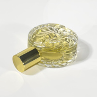 Bouteille en verre de parfum ronde en relief de haute qualité conception Unique pour huile essentielle et diffuseur 50ml emballage de boîte de Volume vide