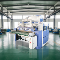 Machine à carder la laine pour garnissage de couettes