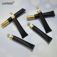 Gloss à lèvres repulpant avec applicateur de massage en métal doré, cosmétiques en marque privée, gloss à lèvres en gros