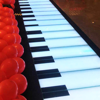 Grand clavier de piano musical interactif lumineux à LED pour les marches