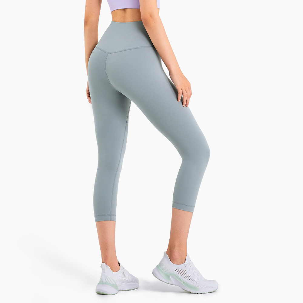 OEM Sportswear Custom Logo Hip Lift Fitness High Waist Yoga Pants Gym Butt Lift Yoga Compress Tights Seamless Cropped Trousers