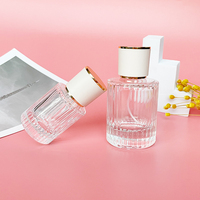 Nuevo Estilo Botella de Perfume de Vidrio de Lujo de 30ml con Forma de Cilindro y Frasco de Vidrio Transparente con Atomizador de 50ml