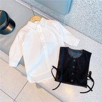 Ensemble 2 pièces pour femme : Chemise à col et manches longues avec boutons et gilet court à nouer sur le côté, tenue décontractée à superposer