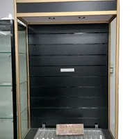 Meuble de présentation mural robuste en métal doré et MDF avec éclairage LED pour magasin de détail, idéal pour la présentation d'accessoires de téléphonie et de produits de vapotage - Offre Spéciale