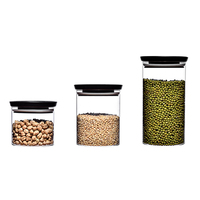 Vente en gros de bocaux de stockage en verre à haute teneur en borosilicate Taille personnalisée 450ml 700ml 1100ml Pot en verre de miel Couvercle en silicone pour le stockage des aliments