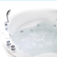 Baignoire ronde en acrylique pour deux personnes de la marque ARROW avec installation encastrée, style encastré, drain intégré, utilisation en appartement, massage, bain à remous