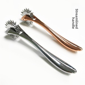 Masseur intime à rouleaux avec accessoires métalliques pour une stimulation intime et une expérience agréable pour adultes - Product Image 1