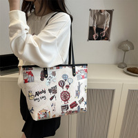 Sac fourre-tout en PU grande taille de haute qualité pour femme, nouveau style automne, sac sous le bras à fermeture éclair avec motifs graffiti et blocs de couleur