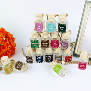 Aromatizante para Auto en Oferta, Multi-Aroma, Botella de Vidrio y Madera, Colgante Decorativo con Aceites Esenciales - Product Image 1