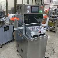 Machine à sceller entièrement automatique pour la conservation de l'air conditionné Machine pneumatique à sceller et à emballer à une sortie à quatre boîtes