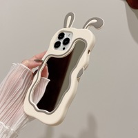 Coque de téléphone portable en silicone mignonne avec miroir de maquillage en forme d'oreille de lapin 3D pour filles pour iPhone 15 14 13 Pro Max