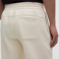 Pantalon de jogging mi-lourd pour homme ODM avec cordon élastique, logo personnalisé, teinture unie, en molleton bouclette tricoté avec poche arrière