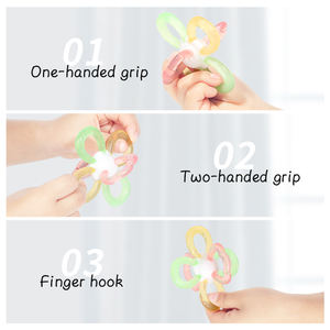 Nueva versión, juguete sensorial para la dentición de <span class=keywords><strong>Manhattan</strong></span>, anillos masticables de fácil agarre, masajeador de goma calmante infantil de silicona de grado alimenticio sin BPA - Product Image 6