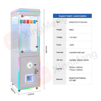 Distributeur de capsules à monnayeur pour salles d'arcade