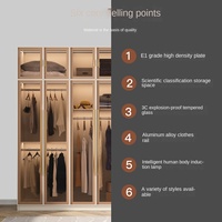 Armoire moderne de luxe avec portes en verre et fonction d'éclairage, armoire en bois pour la chambre à coucher, système d'organisation de rangement