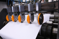 Équipement de production pour le découpage, le refendage, le superposition, l'emballage et le conditionnement en carton de rouleaux de papier copie A4 de qualité commerciale