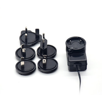 Chargeur de bureau interchangeable 12V 1.5A avec prise DC standard britannique, protection OVP/OTP/SCP, 18W CC-CV pour éclairage LED et usage médical