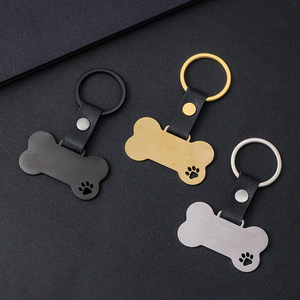 Ywggu स्टेनलेस स्टील गर्म बिक्री खाली pu चमड़े के कुत्ते की हड्डी की हड्डी के साथ उच्च गुणवत्ता वाले अनुकूलित लोगो धातु कुंजी श्रृंखला - Product Image 1