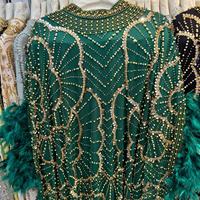 Robe de soirée élégante Kaftan pour l'Aïd, vêtement islamique moderne, Abaya de luxe, manches à plumes, robe longue de soirée perlée et pailletée, coupe ample