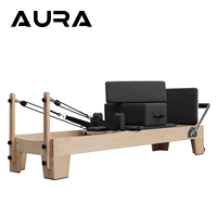Reformer de Pilates professionnel en érable avec ressorts de qualité commerciale, banc de gym réglable et conçu pour les athlètes avancés.