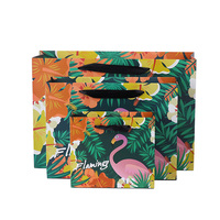 Poignée de ruban de luxe emballage de magasinage de boutique sacs cadeaux en papier imprimés personnalisés avec logo