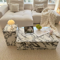 Table basse de luxe en marbre Calacatta Viola sur socle bas, personnalisée par YUSHI, pour salon moderne et décoration intérieure