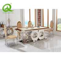 Ensemble de table à manger, design à la mode, en acier inoxydable, avec base en marbre