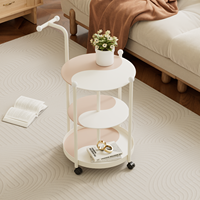 Table ronde en verre trempé à plusieurs niveaux avec cadre blanc amovible et chariot métallique pour usage domestique