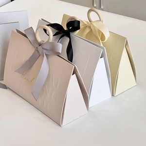 Luxury Shopping Paper <b>Bag</b> With Ribbon Handle Logo <b>Hot</b> Foiled Stamping Black Matt Paper <b>Bag</b> With Wood Ring and Ribbon Handle - Product Image 3