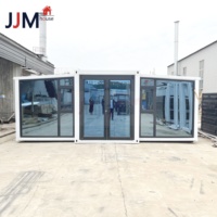 Maisons conteneurs préfabriquées extensibles à structure légère en acier de 20 pieds avec murs en panneaux sandwich, installation rapide, design moderne