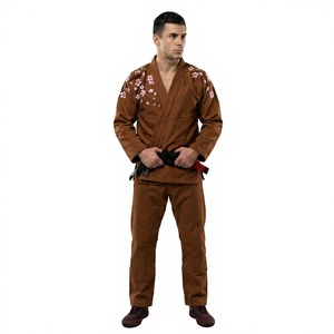 ชุดกิโมโนบราซิลเลียนยิวยิตสู (BJJ Gi) สีน้ำตาลสำหรับผู้ชาย ขายดีที่สุด พร้อมลายปักสีชมพูแบบกำหนดเอง ผ้าฝ้าย 100% แห้งเร็ว ระบายอากาศได้ดี - Product Image 1