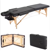 Table de massage et de soin du visage moderne en cuir synthétique pliable de luxe, portable, en bois, pour hôtel, salle de sport, salle de bain