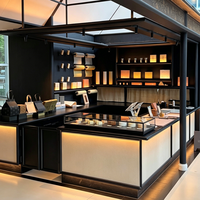 Edgy Luxe Cosmetics Boutique Featuring Tiered Open Shelves, Partial Enclosure Checkout, and Integrated LED Display Shelves
