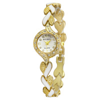 Montre à quartz pour femmes élégante avec design en zircone, bracelet en acier coloré, montre-bracelet personnalisée