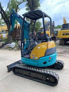 Excavatrice Kubota U20 d'occasion, micro-excavatrice sur chenilles avec peu d'heures de fonctionnement, idéale pour les travaux de jardinage et les projets de construction en espaces restreints. - Product Image 1