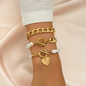 Retro-chic, light luxury, unique faux pearl heart pendant OT buckle <b>bracelet</b> <b>set</b>, European and American style multi-layered - Product Image 1