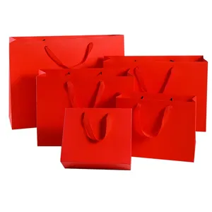 Wholesale <b>Red</b> Kraft Paper Gift Bags with Handles for Wedding Birthday Parties and Shopping Elegant Packaging - Product Image 6