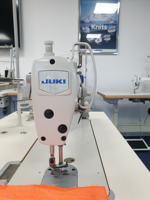 Machine à coudre industrielle à point droit Jukis 8100E d'occasion en bon état
