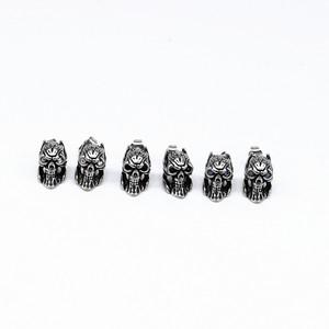 Yunnique – boucles d'oreilles en acier inoxydable 316, design tête de mort, yeux bleus, Style Punk Rock, pour hommes et femmes, bijoux à la mode - Product Image 3