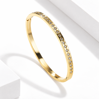 Bracelet jonc géométrique en zircon transparent, acier inoxydable avec placage sous vide or 14 carats, ligne de pierres facettées dorées