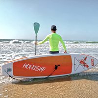 En stock HOEX Planche de paddle gonflable portable (SUP) 10'6'' avec une seule aileron, charge maximale 150 kg, utilisation en mer, comprend pompe, pagaie et leash