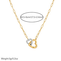 Collier ras du cou tendance en acier inoxydable plaqué or avec pendentif double cœur color-block de luxe léger pour femme
